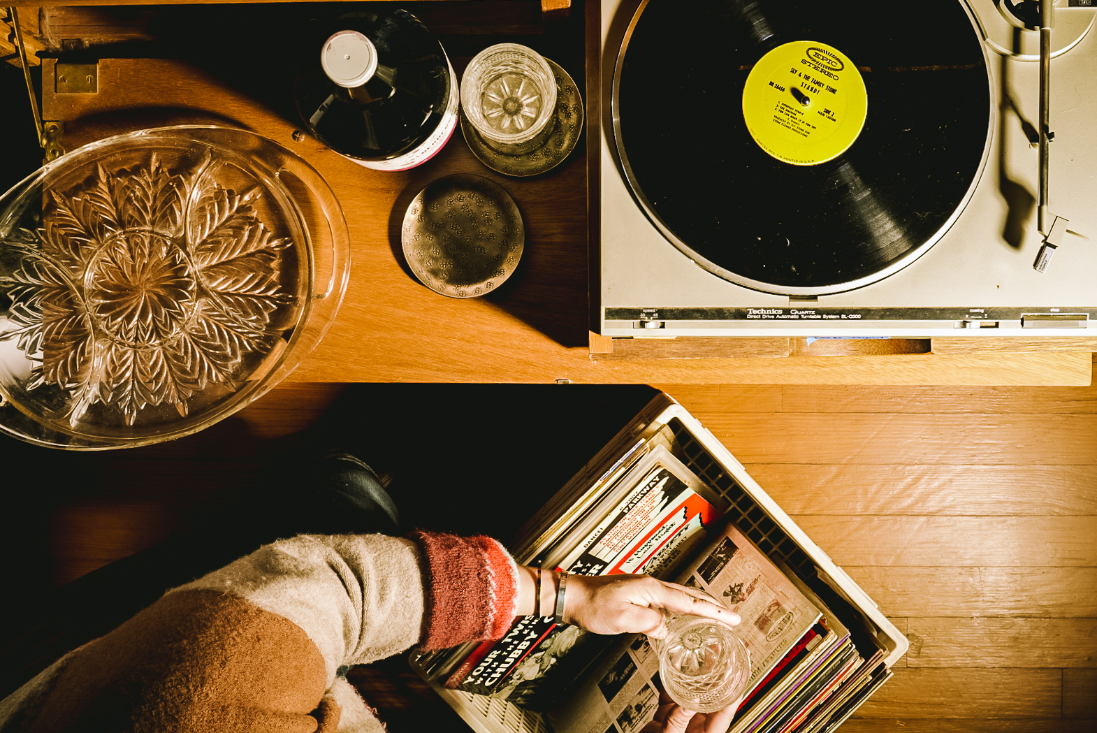 person looking through record bin